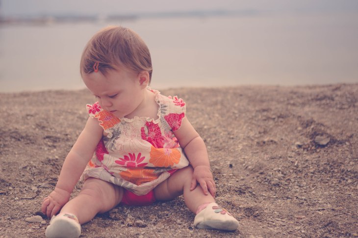 Lyla loved the feel of the sand.